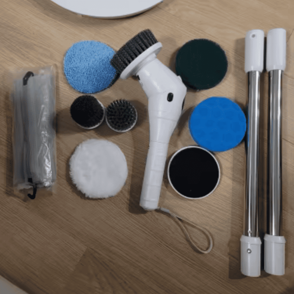 Cleaning tool set with various attachments on a wooden surface