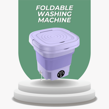 Purple foldable washing machine on a white platform with a green background and text.