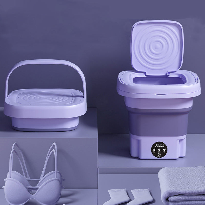 Collapsible purple washing machine with accessories on a purple background